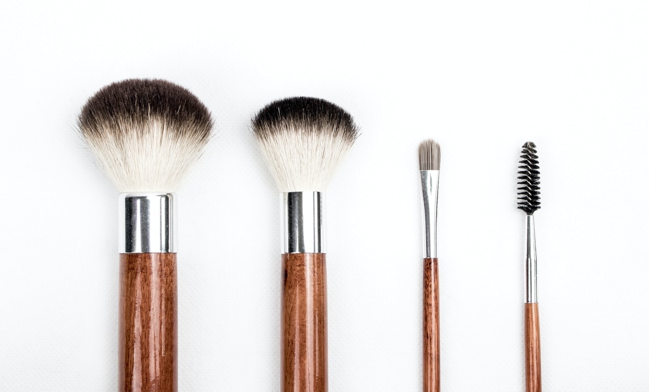 How often should makeup brushes be washed?
